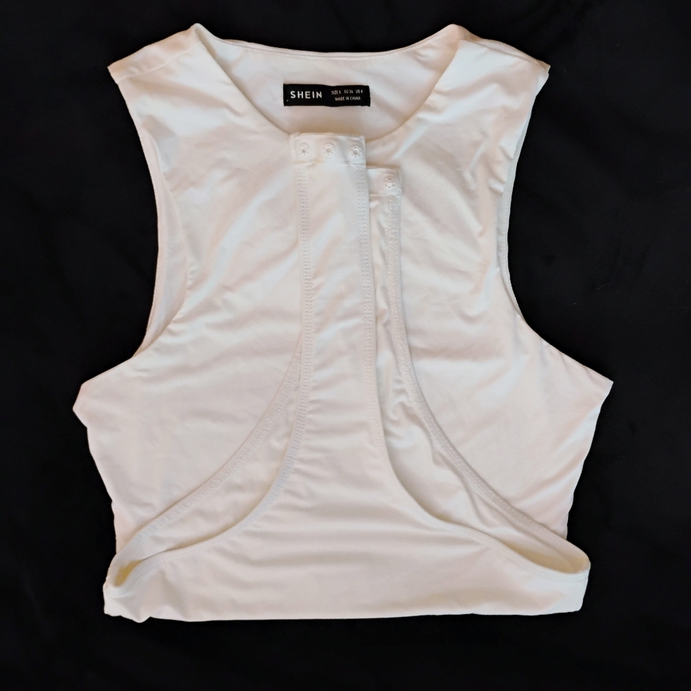 Small, white bodysuit